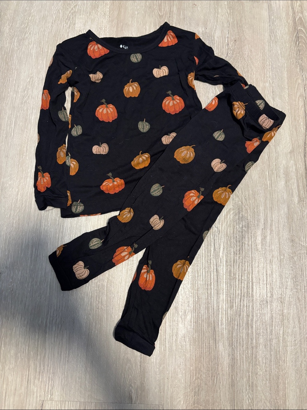 Kyte BABY Black Pumpkin Print Pajama Set with Orange Accents